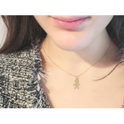 Baby with heart charm in 18kt yellow gold