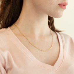 Photo of worn 50cm Necklace 3+1 width of 2.2mm 18kt yellow gold
