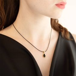 Photo of worn Pendant Synthesis Enamel Baby black on yellow gold