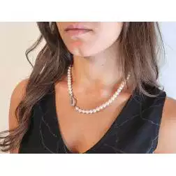 Photo of worn Akoya Pearls Necklace with perforated leaf shaped clasp with Diamonds