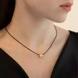 Photo of worn Cross Pendant with Cubic Zirconia