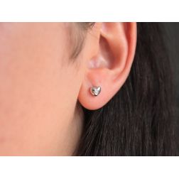 Photo of worn Rounded Heart Earrings in White Gold and Diamonds