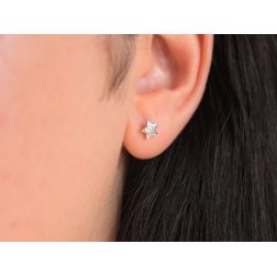 Photo of worn Flat Star Earrings in White Gold and Diamonds