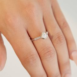 Photo of worn GIA 0.40 ct Platinum and Diamond Solitaire Ring