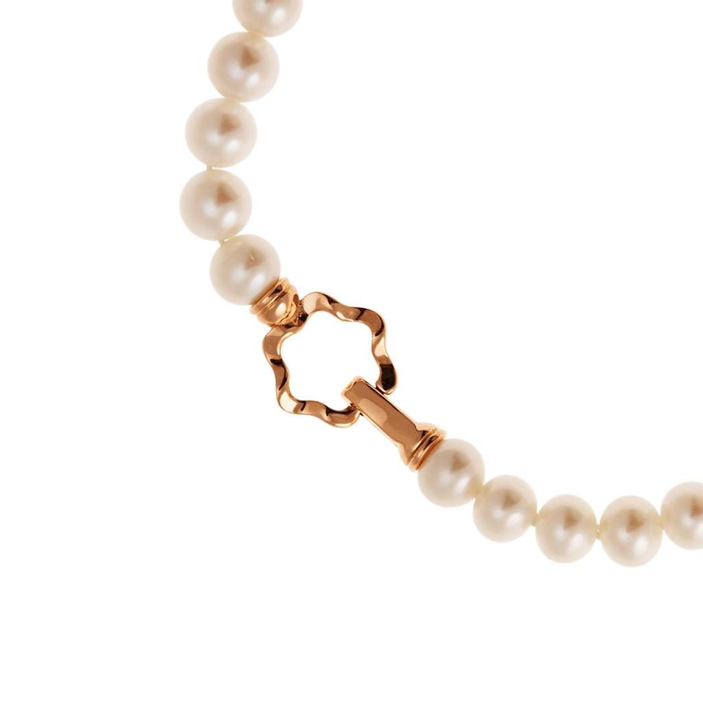 Fresh Water pearls bracelet with 18kt Rose Gold Flower clasp