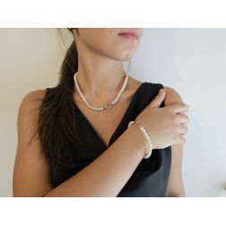 photo of worn Fresh Water pearls bracelet and necklace with 18kt Rose Gold Flower clasp