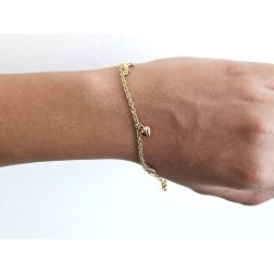 Photo of worn Bracelet with 7 pendants 3 Moons 2 Hearts 2 Stars in Three Colors