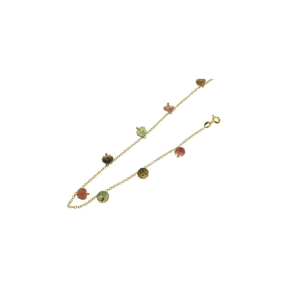 Yellow gold anklet with tourmaline pendants.