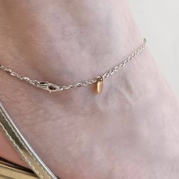 Photo of worn Anklet white gold chain with star and heart in rose gold