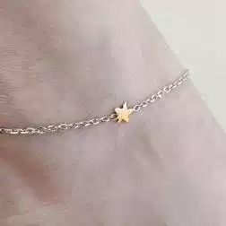 Photo of worn Anklet white gold chain with star and heart in rose gold
