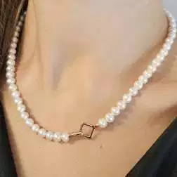 photo of worn Fresh water pearls Necklace with 18kt Rose Gold Square clasp