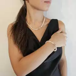 photo of worn Fresh water pearls Necklace with 18kt Rose Gold Square clasp