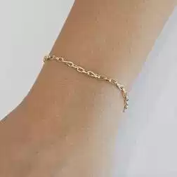 Photo of worn Yellow and white gold 3+1 Ovals and Drop chain Bracelet