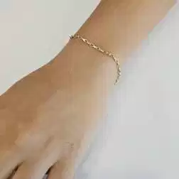 Photo of worn Yellow and white gold 3+1 Ovals and Drop chain Bracelet