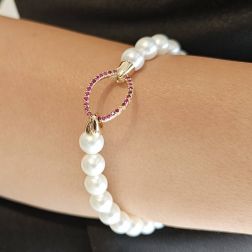 Photo of worn Fresh Water pearls bracelet with Rubies on 18kt Rose Gold clasp