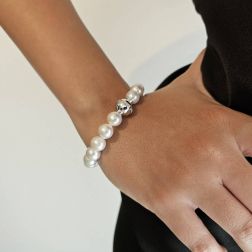 Photo of worn Fresh Water pearl bracelet Spherical clasp with diamonds in 18kt White Gold