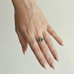 photo of worn Emerald 7mm x 5mm and 10 Diamonds Ring  - Italian size 12