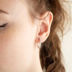 Photo of worn Oval Diamonds Hoops