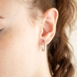 Photo of worn Oval Diamonds and Rubies Hoops