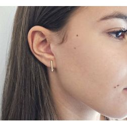 Photo of worn Yellow Gold Rectangular Lobe Hoops with Zircons