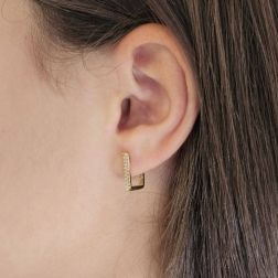 Photo of worn Yellow Gold Rectangular Lobe Hoops with Zircons