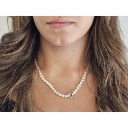 Photo of worn Akoya pearl necklace with Diamonds on 18kt White Gold clasp