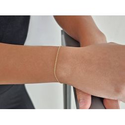 Bracciale palline oro giallo 19cm x 1,3mm chiusura moschettone foto indossata