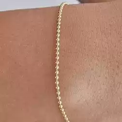 Bracciale palline oro giallo 18,50cm x 1,5mm chiusura moschettone foto indossata