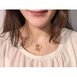 Photo of worn Rose Gold Butterfly Necklace 3 Rubies Stones