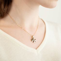 Photo of worn Templar Cross in 18kt Yellow Gold