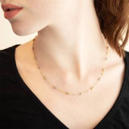 Photo of worn Chain Necklace with Barrels in 18kt Yellow and White Gold