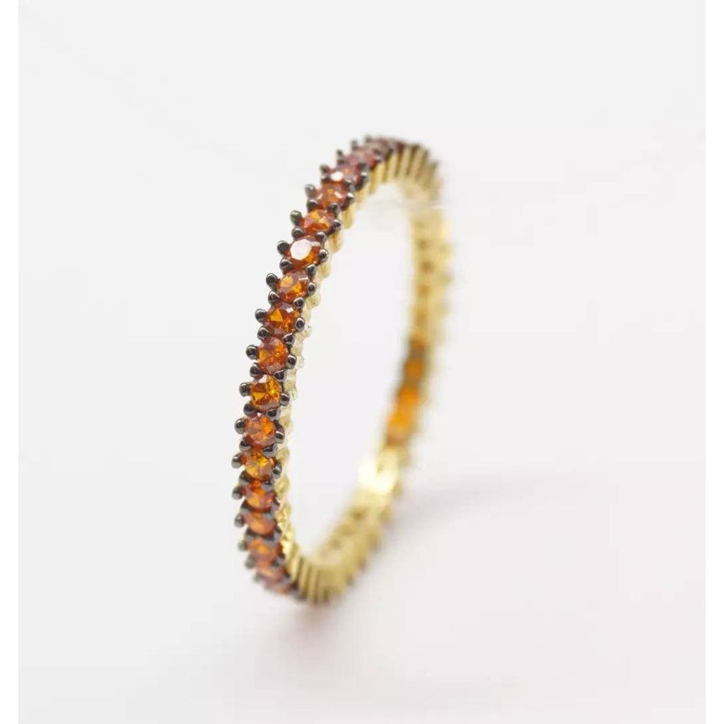 Eternity with brown zircons and burnishing