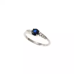 Anello Solitario con Zircone Blu contornato da Zirconi Bianchi oro Bianco