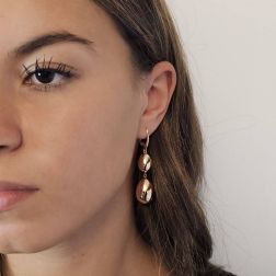Photo of worn 2 Polished Oval Pendant Earrings in 18kt Rose Gold