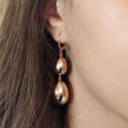 Photo of worn 2 Polished Oval Pendant Earrings in 18kt Rose Gold