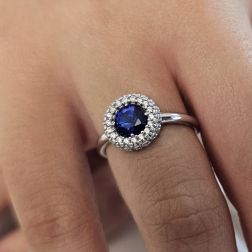 Photo of worn White Gold Ring Round blue zircon surrounded by zircons
