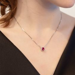 Photo of worn Necklace with Ruby Solitaire on squared bezel