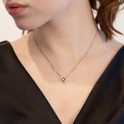 Photo of worn Necklace with Ruby Solitaire on squared bezel