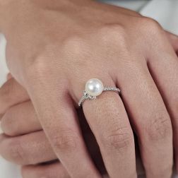 Photo of worn Knot Ring with Pearl White Gold