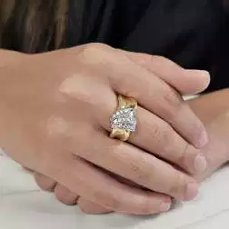 photo of worn Yellow Gold Bow Ring with Zircons
