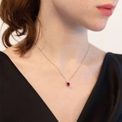 Photo of worn 18kt White Gold Red Ruby and 3 Diamonds Point Light Necklace
