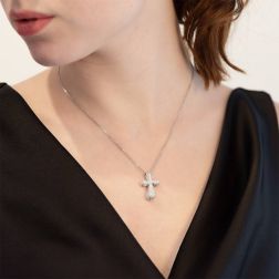 Photo of worn Necklace with diamonds rounded cross
