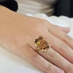 Photo of worn Yellow Gold Rectangular Citrine Topaz Ring