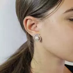 Photo of worn Akoya Pearl and Spiral Round Diamonds Earrings