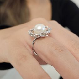 Photo of worn Pearl Flower Ring 1 cm with Zircons in White Gold