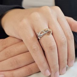 Photo of worn Long Hug Ring in 18kt white and rose gold