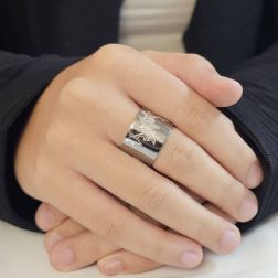 Photo of worn White and black gold star ring