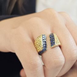 Photo of worn Ring with Blue and Yellow Gold Zircons