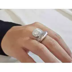 Photo of worn Drop ring with zircons White Gold