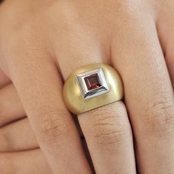 Photo of worn Yellow and White Gold square Garnet Ring
